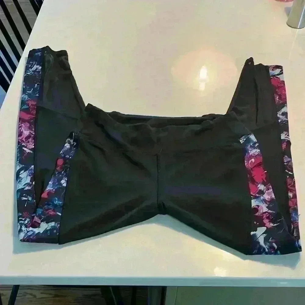 Metaphor black tights with bright pink/blue design on legs. Sz M